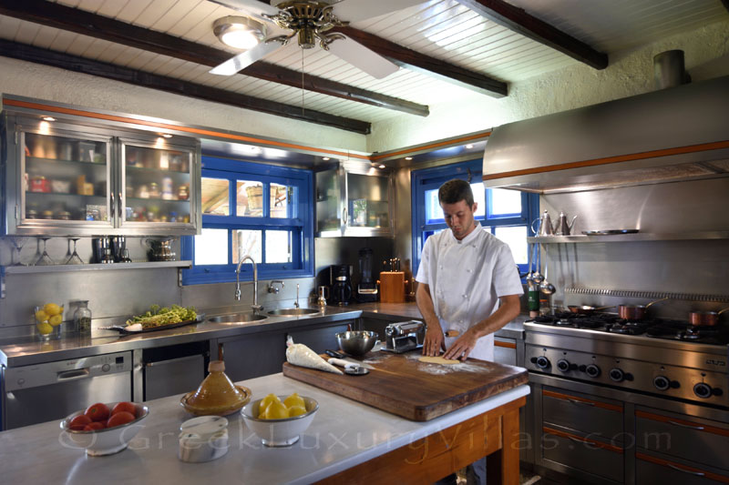 chef at work kitchen of luxury villa with private chef butler boat