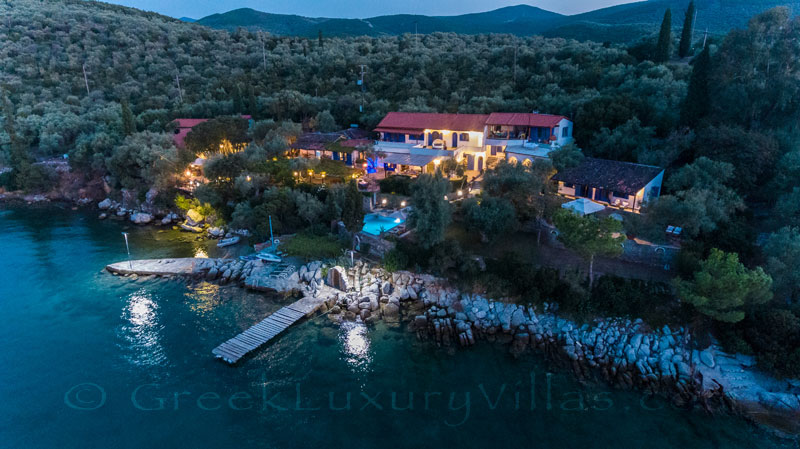 luxurious seafront villa with private beach boat chef butler at night