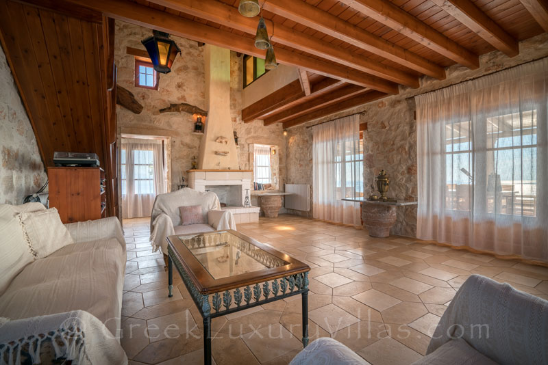 The lounge of a seafront villa with a pool in Zakynthos